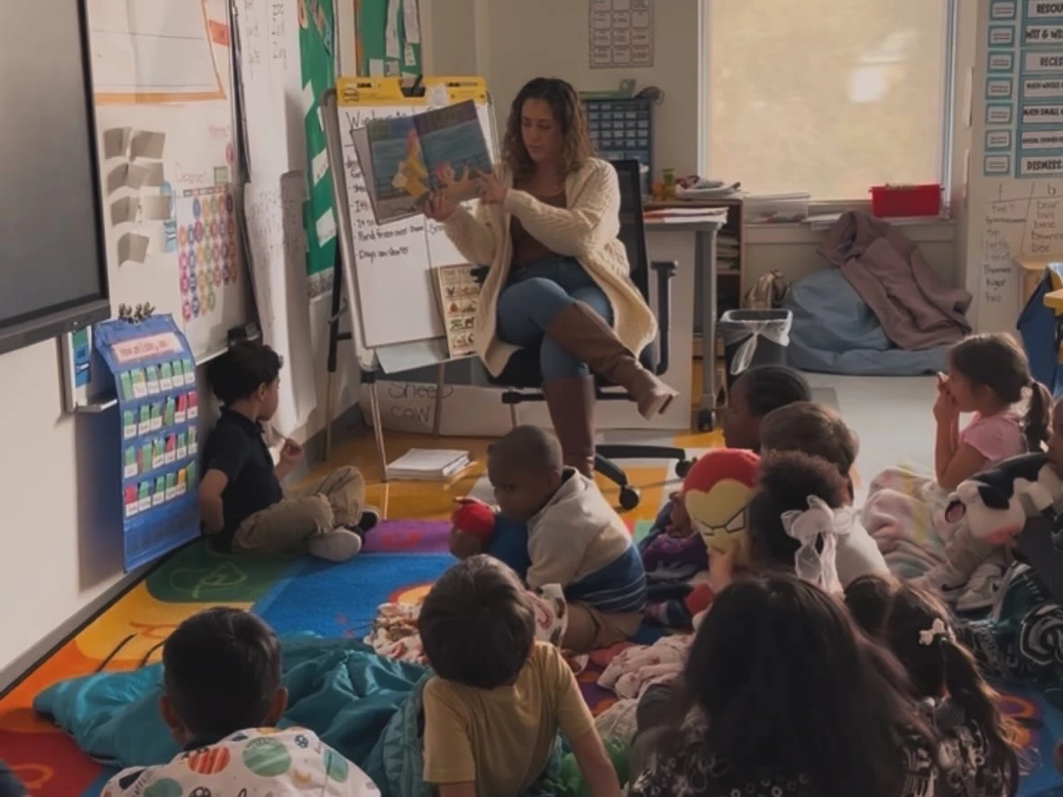 Chelsea reading to first-grade classroom